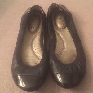 Me Too flats in black.